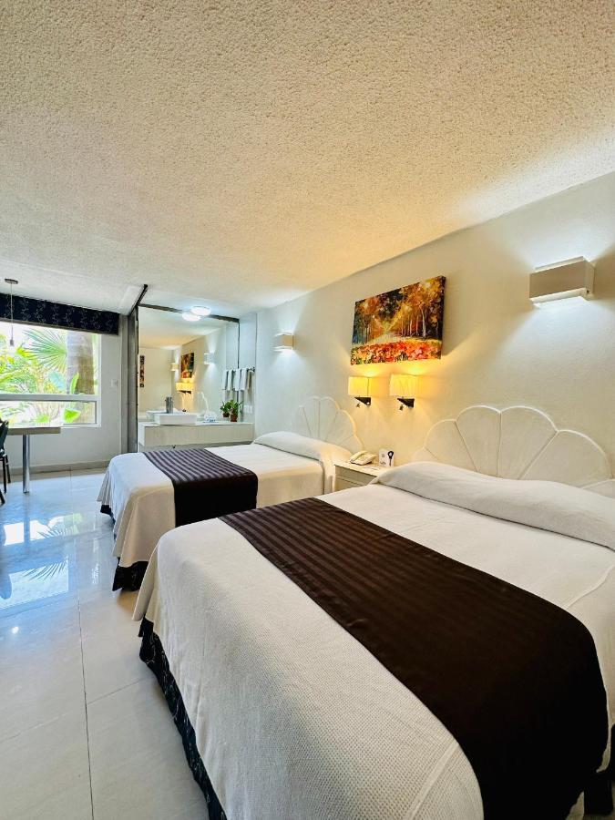 Hotel Plaza Caribe Cancún Exterior foto